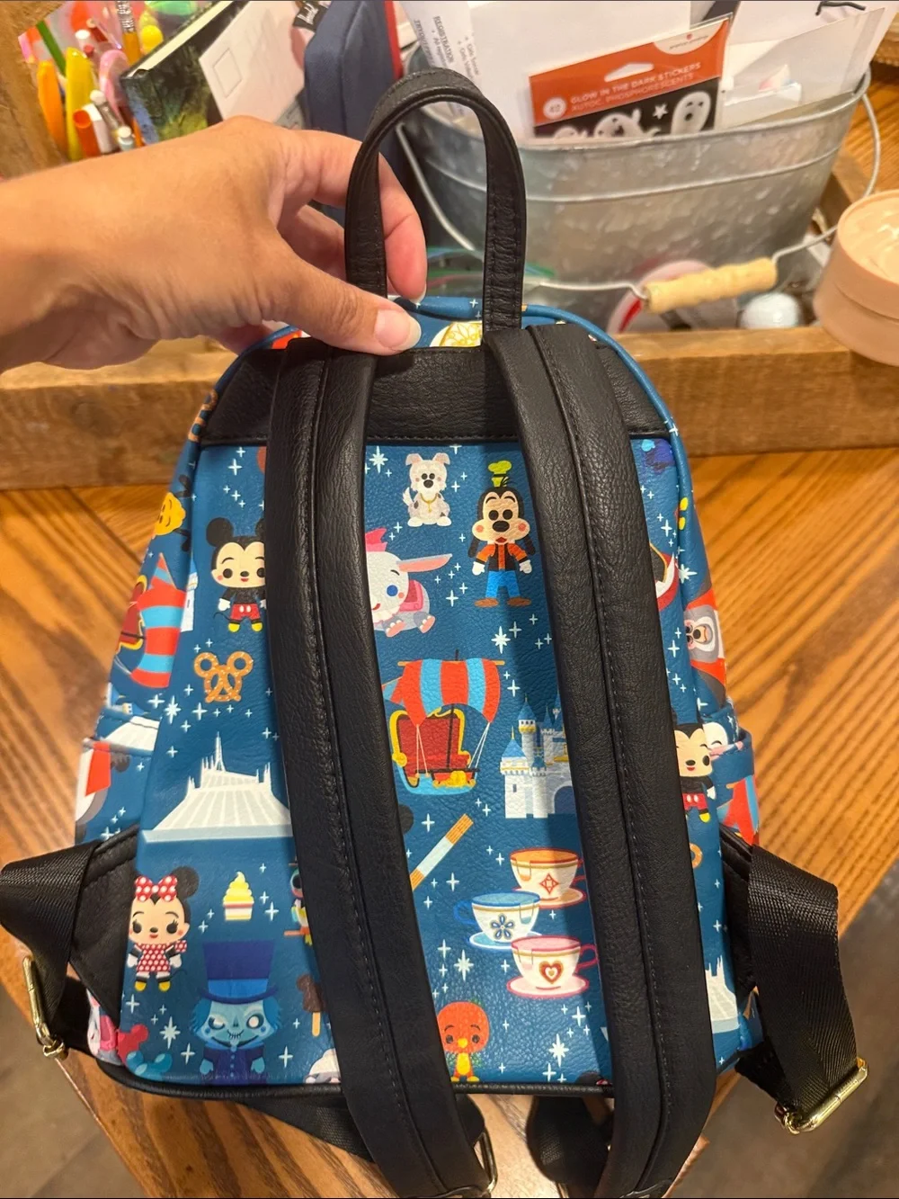 Loungefly Blue Mini Backpack with Colorful Theme Park Character Print